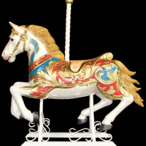 A white and gold Carousel Horses on a black background. Where Moments Become Memories