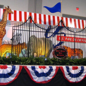 A red, white, and blue Circus Animal Flats with giraffes and zebras.