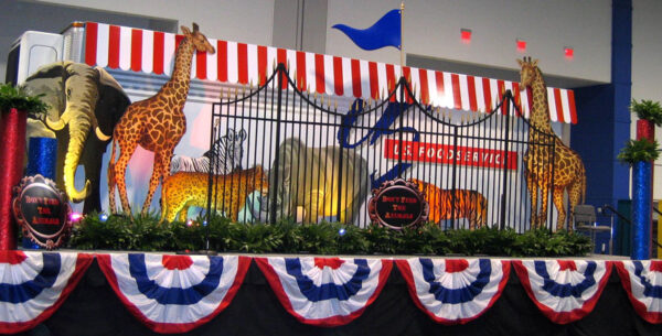 A red, white, and blue Circus Animal Flats with giraffes and zebras.