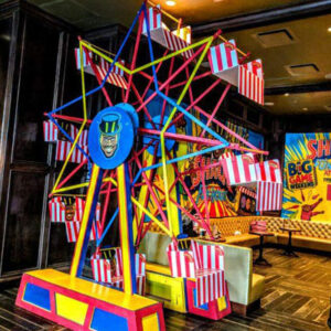 A colorful Ferris Wheel in a restaurant.