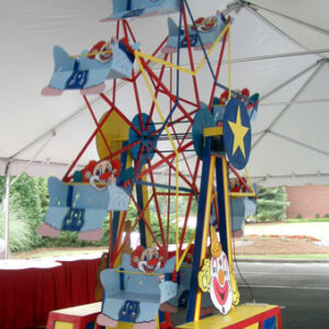 The Ferris Wheel is red, blue, and yellow.