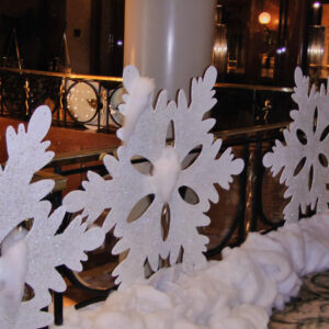 Giant Snowflakes on a railing.