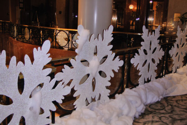 Giant Snowflakes on a railing.