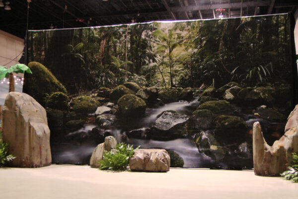 A waterfall in the middle of African Stage Sets and Entrances.