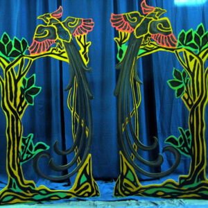 A pair of Oz Trees and Birds on a blue background.