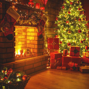 An Art Deco Backdrop and presents in front of a fireplace.