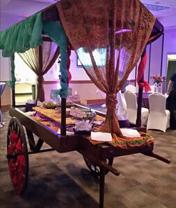 A Moroccan Buffet Cart is set up in a room.