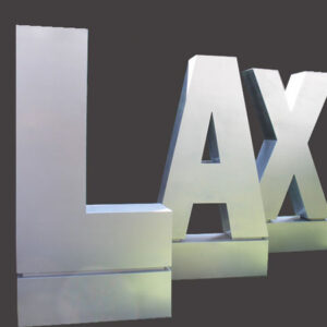 A metal sign with the word lax on it.