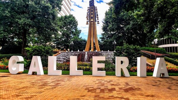 A sign with the word Block Letters in front of it.