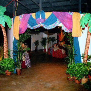 An Arabian Entrance decorated with palm trees and other decorations.