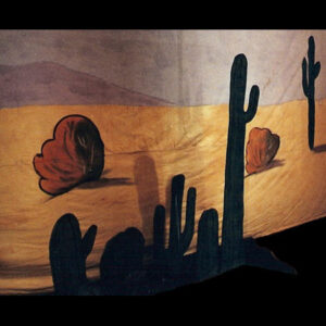 A backdrop of a desert scene with cactus plants.