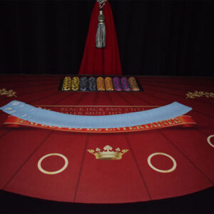 An image of a Blackjack table with a crown on it.