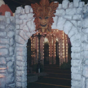 The entrance to a castle is decorated with Fire Eater lights.