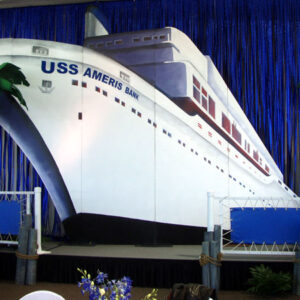 A Cruise Ship Panel backdrop on a stage.