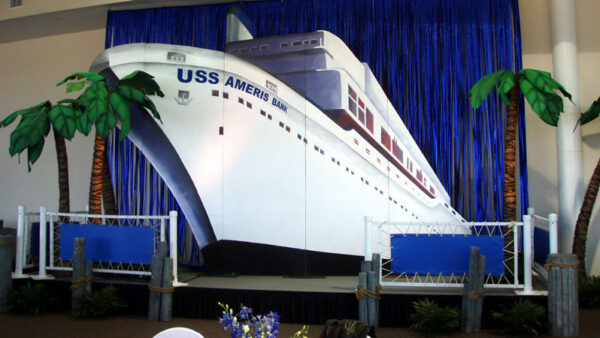 A Cruise Ship Panel backdrop on a stage.