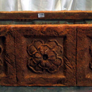 A large Decorative Planters on a table.