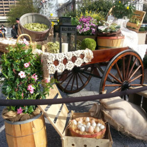 A Flower Cart with flowers on it.