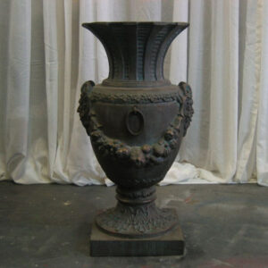 Decorative Urns and Finials on a table.