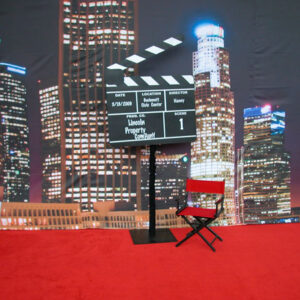 A red L.A Backdrop on a red carpet.