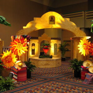 An archway decorated with palm trees.