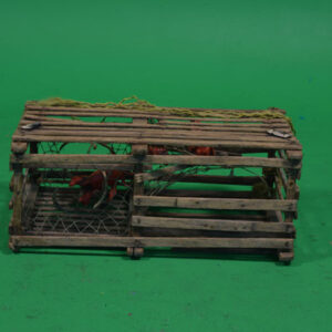 A wooden Lobster Crate on a green background.