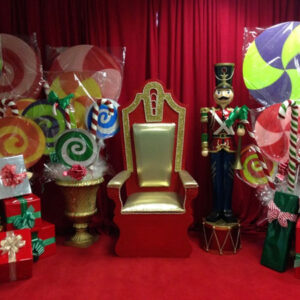 A Christmas throne with lolly pops and nutcrackers.