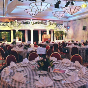 A banquet room set up with Pallet Wood Wall.