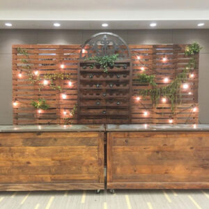 A Pallet Wood Wall in a lobby with plants on it.