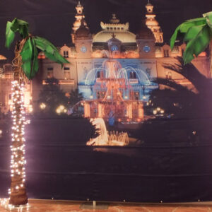 Two Monte Carlo Casino Stage with lights in front of a castle.