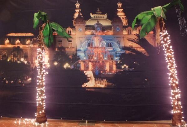 Two Monte Carlo Casino Stage with lights in front of a castle.