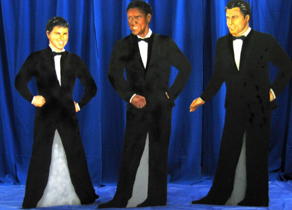 Three men in Character Flats standing in front of a blue curtain.