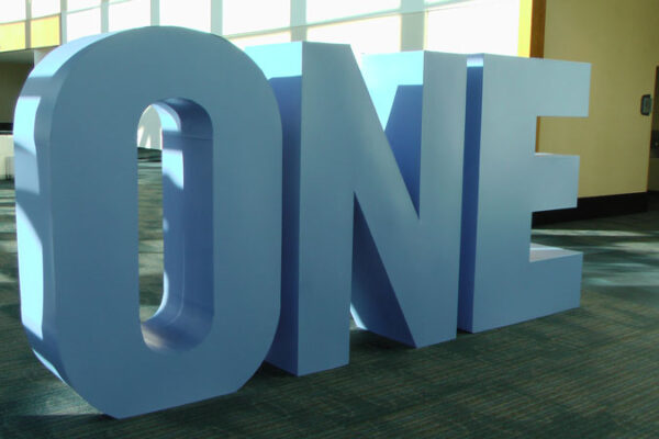 A large blue Block Letters sign.