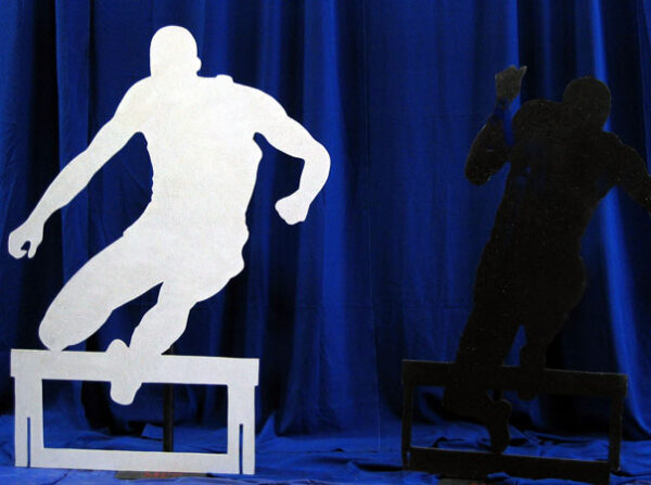 Two silhouettes of the Olympic Games.