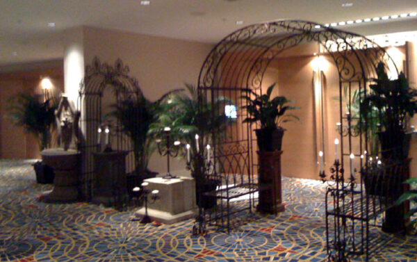 A room with a lot of plants and the "Archways and Entrances".