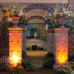 A metal gate in the middle of a walkway.