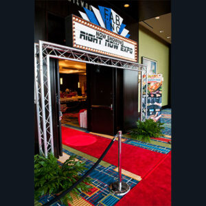 A entrance to a red carpet.