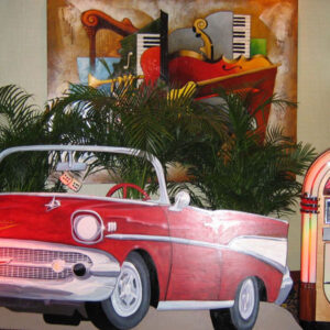 A red Vintage Car Flat and Jukebox.