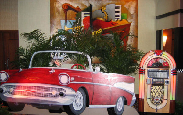 A red Vintage Car Flat and Jukebox.