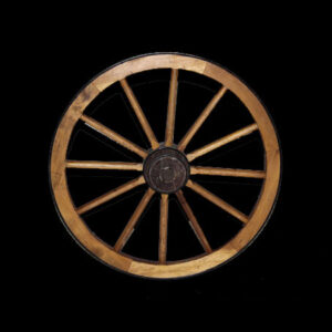 A Wagon Wheel on a black background.