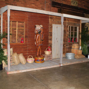 A Western Cigar Storefront building with a wooden door.