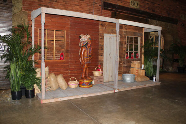 A Western Cigar Storefront building with a wooden door.