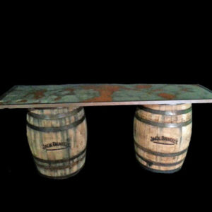 A table with two Whisky Barrel Bars on top of it.