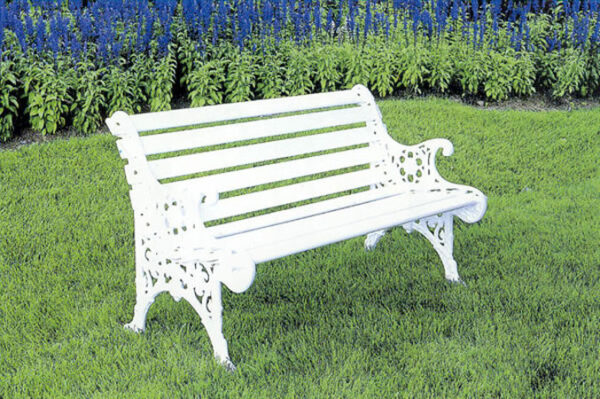 Garden Benches in a grassy area.