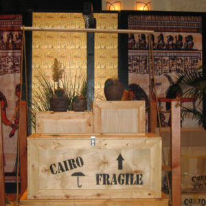 A wooden crate with a sign that says cargo boxes fragile.