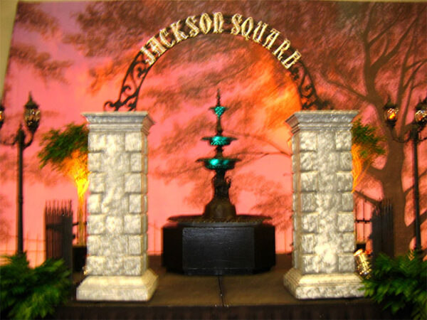 A Mardi Gras Entrances with a fountain.