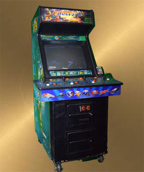 A green and blue arcade machine available for Golden Tee or Big Buck Hunter rental.