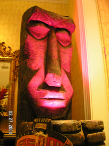 A Tiki Gods statue in a room.