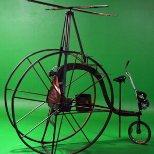 A Steampunk Bike with a helicopter attached to it.