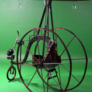 A Steampunk Bike with a wheel attached to it.