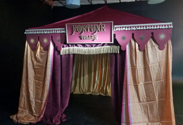 A Fortune Teller Tent with a marquee sign on it.